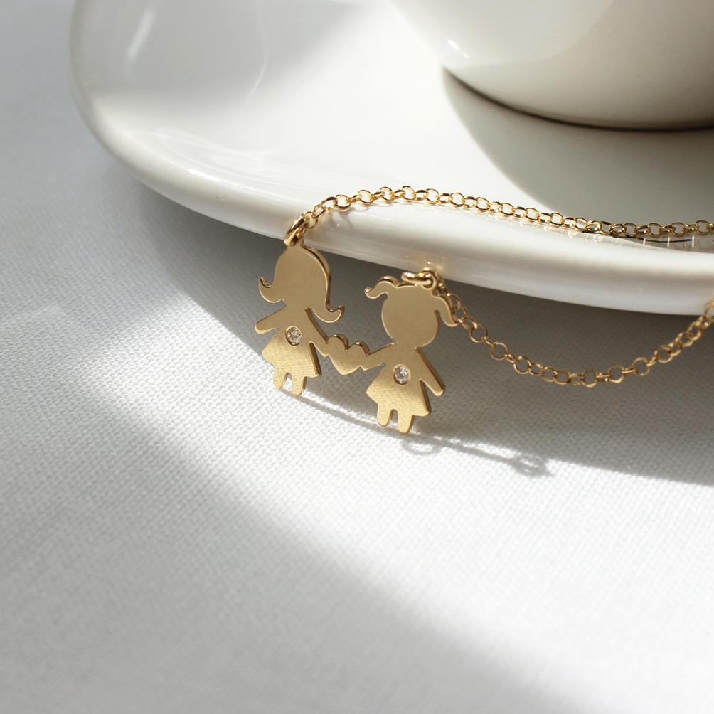 Colar laços de amor. Joia em ouro amarelo 18k e diamantes