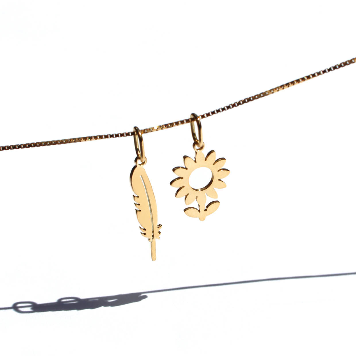 Colar Girassol + Pena - ouro amarelo 18k